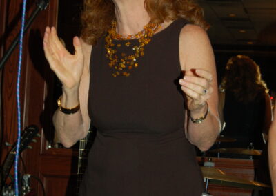 40th reunion at Maggiano's, pictured is Pamela Rose performing on stage with her band.