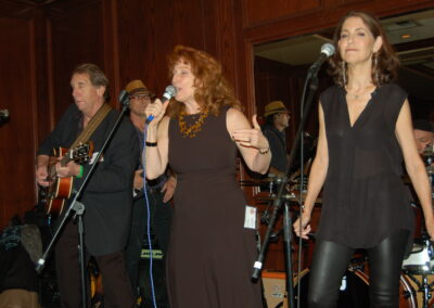 40th reunion at Maggiano's, pictured are Carey Appel, Pamela Rose singing with the band. David Freshman is playing guitar.