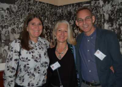 40th reunion at Maggiano's, pictured are Susan Morse, Rise Justman and Keith Rosten standing in front the the class of 1974 group photo