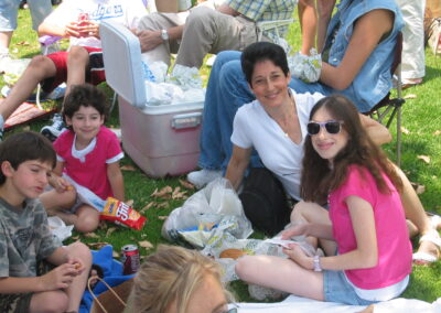 30th reunion picnic on the high school lawn, Sandy Brenner and kids.